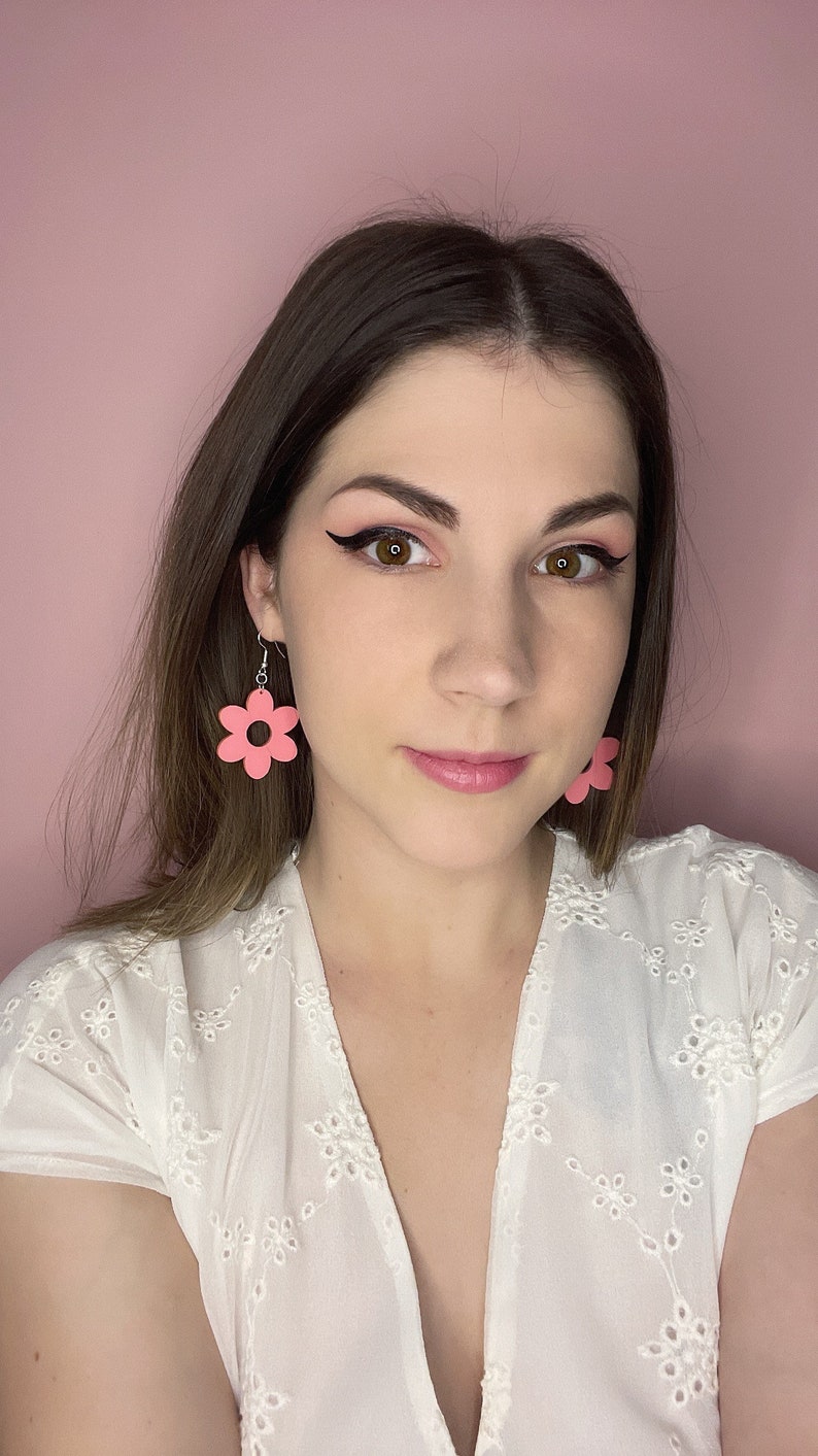 cute laser cut pastel pink acrylic flower earrings. YOU GROW GIRL