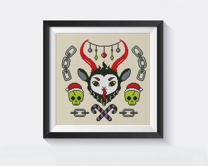 May include: A cross-stitch pattern featuring a cartoon goat with red horns and a black beard wearing a Santa hat. The goat is surrounded by candy canes, skulls, and chains.