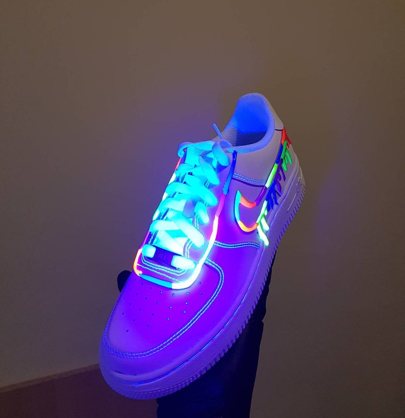 white air force with neon tick