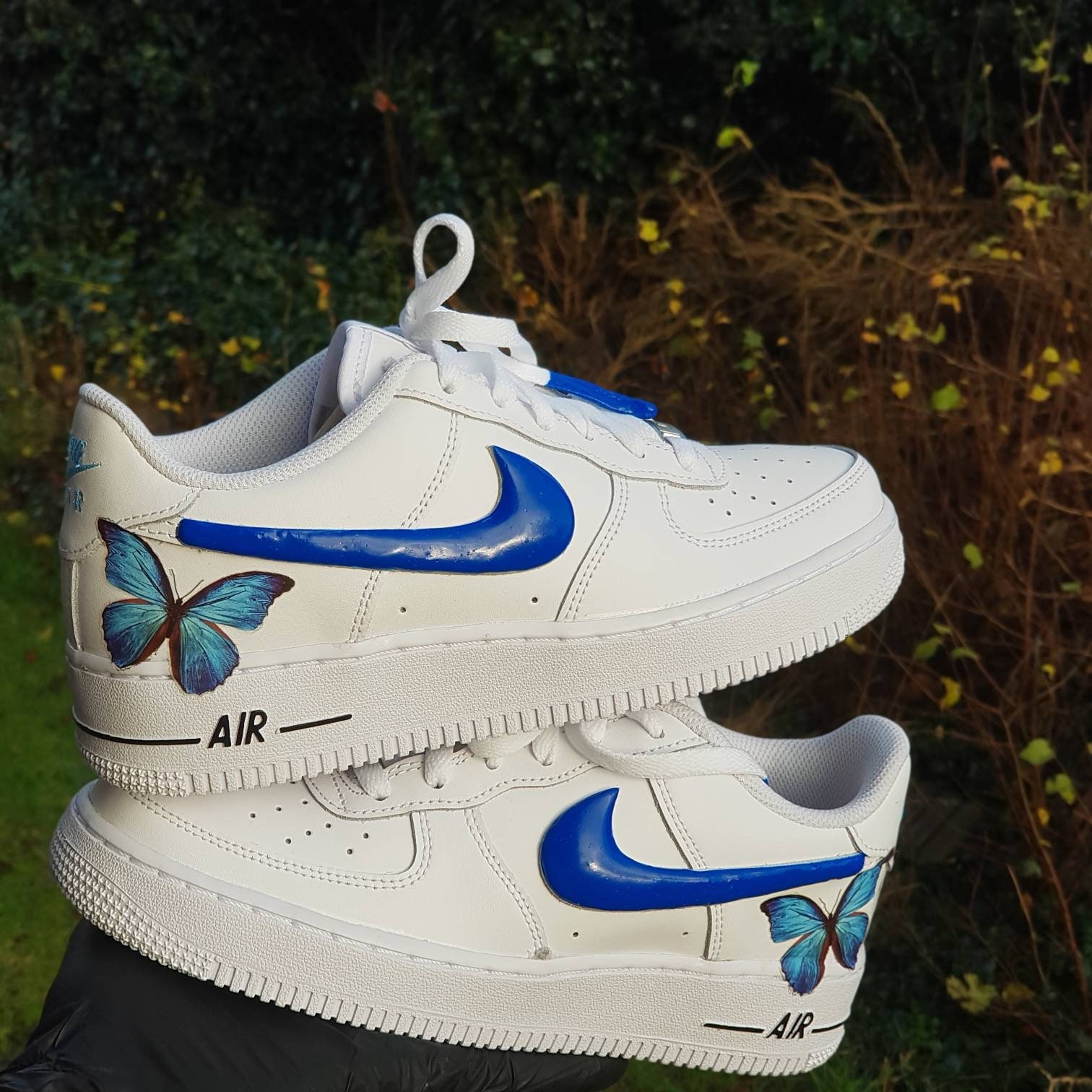 white air forces with blue butterflies