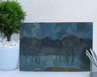 May include: A dark blue oil painting depicting a forest scene with trees silhouetted against a stormy sky. The painting is framed in a simple wooden frame. The artist's signature, "RA 12", is visible in the lower right corner.