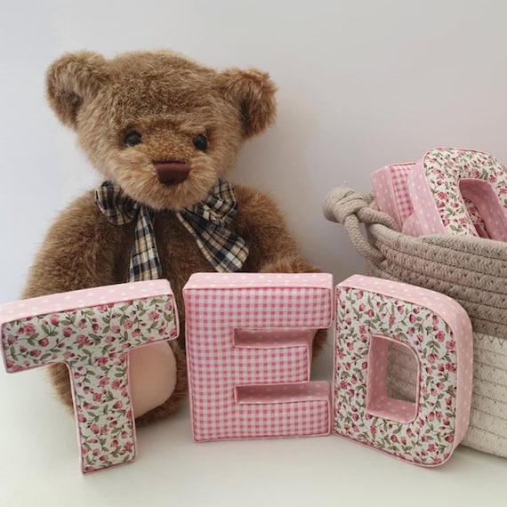 → View on Etsy: Handmade Fabric Letters | Personalised Padded Nursery Decor | 10 cm Tall New Baby Gift - Pink Floral & Gingham Handmade Fabric Letters | Personalised Padded Nursery Decor | 10 cm Tall New Baby Gift - Pink Floral & Gingham