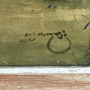 Peut inclure: Gros plan sur une signature sur une peinture. La signature est en encre noire et semble &ecirc;tre "A.E.  Moran".