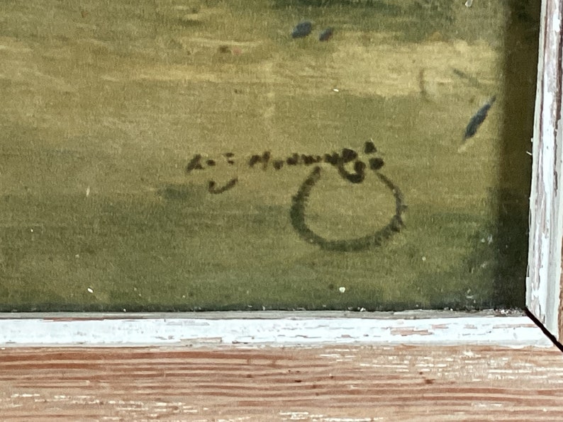 Peut inclure: Gros plan sur une signature sur une peinture. La signature est en encre noire et semble &ecirc;tre "A.E.  Moran".