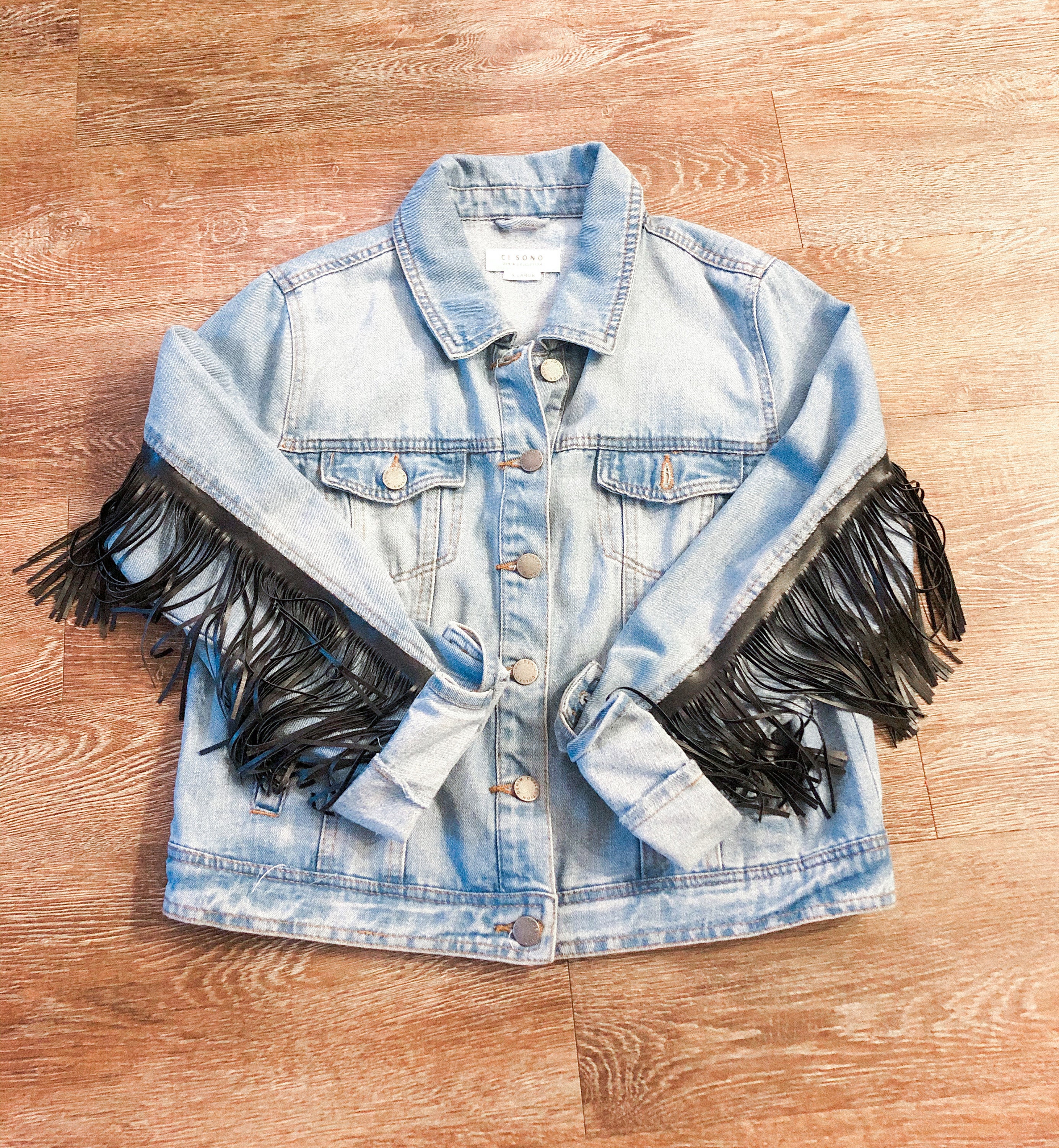 jean jacket with leather fringe