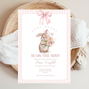 May include: Pink and white gingham baby shower invitation with a watercolor illustration of a brown bunny holding a bouquet of pink flowers. The text reads "Some Bunny is on the Way!" and includes the name Maria Campbell, the date and time of the event, the location, and RSVP information.