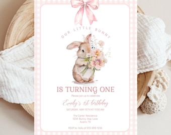 May include: A pink and white invitation card with a watercolor illustration of a bunny holding flowers. The text reads "Our Little Bunny Is Turning One" and includes details for Emily's 1st birthday.