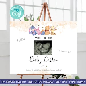 Puede incluir: Un letrero blanco para baby shower sobre un caballete, con personajes de Winnie the Pooh y el texto "Wishes For Baby Carter". Incluye una imagen de ultrasonido y las frases "You are so loved!" y "Can't wait to meet you!"