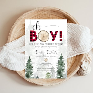 May include: Baby shower invitation with a woodland theme. The invitation features the words "oh BOY!" in a mix of fonts, with the "BOY" in red and black plaid. The invitation includes the text "LET THE ADVENTURE BEGIN!" and details for the event.