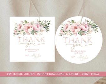 May include: Two thank you tags with a floral design. The tags are white with pink flowers and green leaves. The text on the tags reads "Thank you for showering us with love!" and includes the names "Alice & Robert".