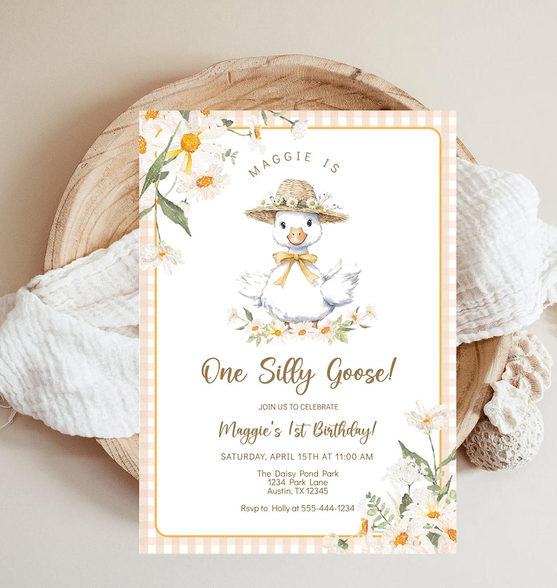 May include: A white and yellow birthday invitation with a cartoon goose wearing a straw hat and surrounded by daisies. The text reads "Maggie is One Silly Goose! Join us to celebrate Maggie's 1st Birthday! Saturday, April 15th at 11:00 AM The Daisy Pond Park 1234 Park Lane Austin, TX 12345 Rsvp to Holly at 555-444-1234"