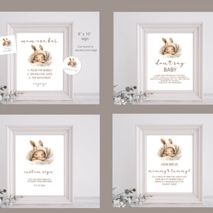 Pu&ograve; includere: Quattro cartelli stampabili per un baby shower. Ogni cartello presenta un adorabile coniglietto dei cartoni animati in una coperta. I cartelli includono istruzioni per un "bar di mom-osa", un gioco "non dire baby", un modello di "cartello personalizzato" e un gioco "quanto &egrave; grande la pancia di mamma?".