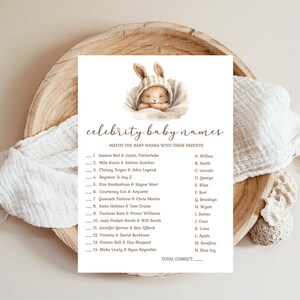 May include: A printable game with a cute cartoon bunny wearing a brown and white hat. The game is called "Celebrity Baby Names" and asks players to match the baby names with their celebrity parents. The names include Jessica Biel, Justin Timberlake, Mila Kunis, Ashton Kutcher, Chrissy Teigen, John Legend, Beyonce, Jay-Z, Kim Kardashian, Kanye West, Courteney Cox, Arquette, Gweneth Paltrow, Chris Martin, Katie Holmes, Tom Cruise, Duchess Kate, Prince Williams, Jada Pinkett Smith, Will Smith, Jennifer Garner, Ben Affleck, Victoria, David Beckham, Kristen Bell, Dax Shepard, Blake Lively, and Ryan Reynolds.