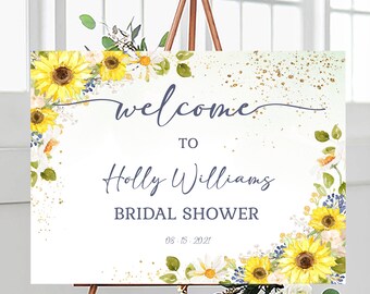 May include: Welcome to Holly Williams Bridal Shower sign with a sunflower and daisy floral design on a white background with gold glitter. The date is 08-15-2021.