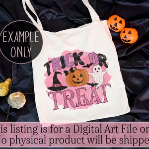 K&ouml;nnte beinhalten: Eine wei&szlig;e Tragetasche mit einem rosafarbenen Aquarellhintergrund und dem Text "Trick or Treat" in Schwarz. Ein Hexenhut, ein K&uuml;rbis und ein Geist sind &uuml;ber den Text gelegt. Die Tasche hat schwarze Tr&auml;ger.