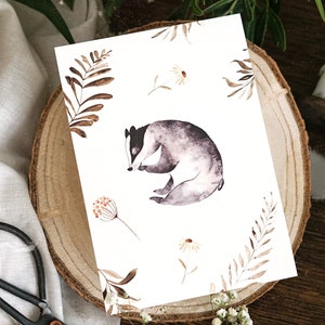 Carte de voeux blaireau endormi animaux de la forêt plantes