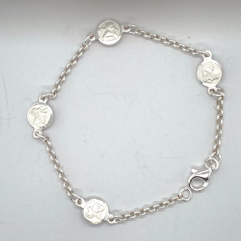 Handmade Cherub Angel Bracelet Sterling Silver Stationed Cherub Angel Bracelet. Sterling Silver Bracelet