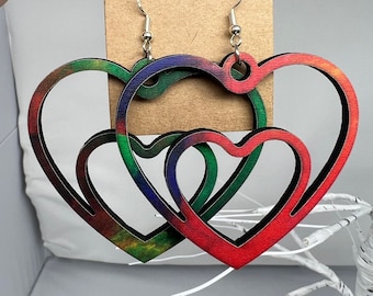 Orecchini pendenti a doppio cuore