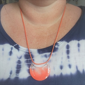 Handmade UV Reactive Resin Necklace: Glow in the Dark Orange Crescent