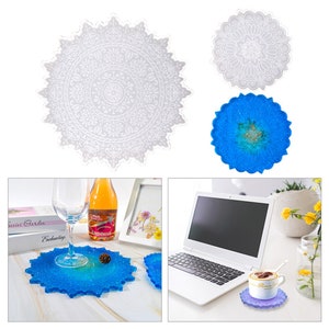 May include: Two clear silicone molds for making resin coasters. The molds are shaped like a mandala with a detailed design. The image also shows three finished resin coasters in blue and white.