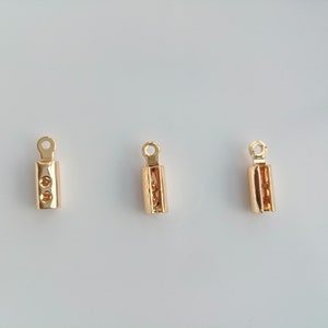 Groothandel vergulde opvouwbare krimpdop met lus, 3 x 10 mm, benodigdheden voor het maken van sieraden