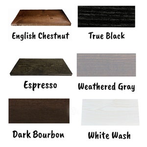 May include: A selection of wooden samples showcasing different finishes: English Chestnut, True Black, Espresso, Weathered Grey, Dark Bourbon, and White Wash. Each sample is labelled with its colour name in a handwritten font.