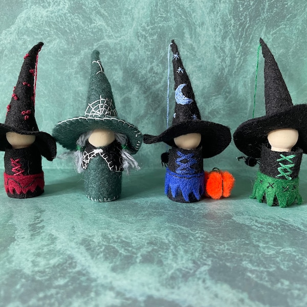 Peg Doll Witches made with felt and hand embroidered.