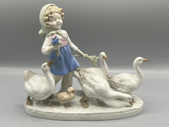 Vintage “little Girl With Flowers and Geese” Porcelain Figurine
