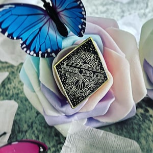 The Suriel Enamel Pin