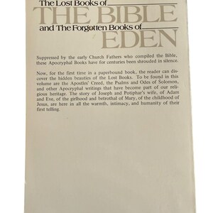 May include: A paperback book titled "The Lost Books of The Bible and The Forgotten Books of Eden." The cover is off-white with text in a dark grey font. The book's description is printed below the title, with the ISBN at the bottom.