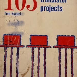 May include: A vintage book cover with the title "103 simple transistor projects." The number 103 is in large red font, with the rest of the title in blue. The author's name, Tom Kneitel, is also visible. The cover features a graphic of three red rectangles.