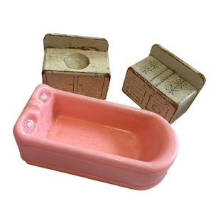 Plastic pink bath tub bathtub wood range stove oven and sink vanity
