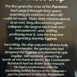 May include: A book cover with the title "The Ghost Ship" in white text. The text describes a space adventure involving a starship, a black hole, and a crew. The bottom of the cover lists the movie "The Black Hole" and the actors.