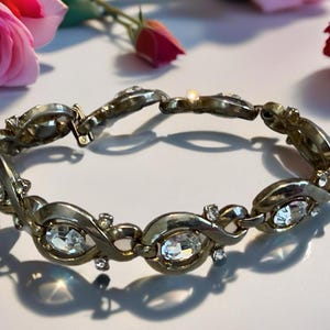 Trifari polished gold bracelet rhinestones signed Trifari jewelry