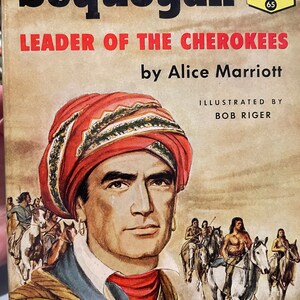 May include: A book cover with the title "Sequoyah Leader of the Cherokees" by Alice Marriott. The cover features an illustration of a man wearing a red turban and a brown jacket, riding a horse. The book is part of the Landmark Books series.