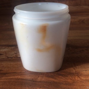 Milk glass jar.