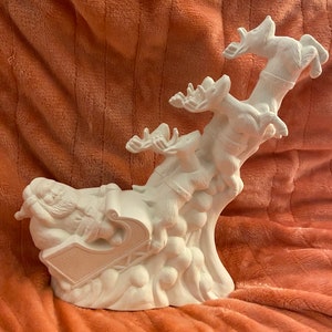 Ceramic bisque Christmas santa and sleigh with reindeer ready to paint