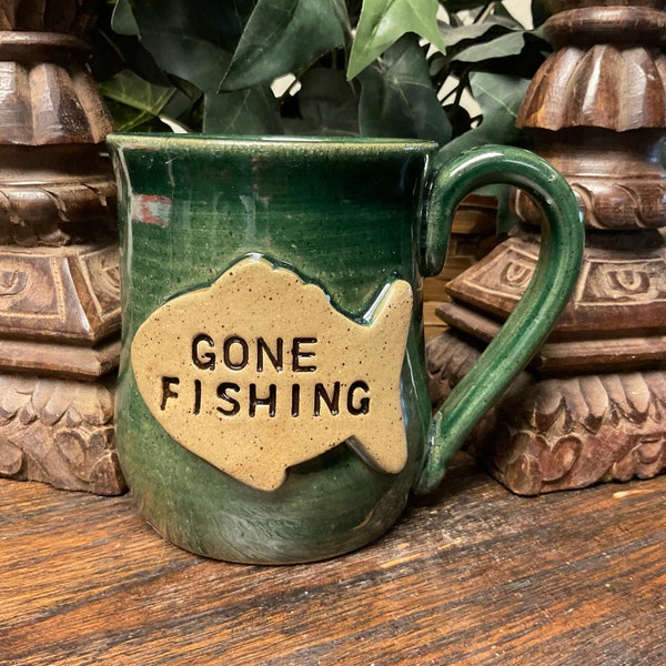 Holds 16 oz. Handmade Gone Fishing pottery coffee mug, tea cup.  Microwave and dishwasher safe.  Unique gift.  Ready to ship.