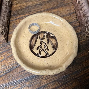Handmade Sasquach ring dish, spoon rest, ashtray, trinket dish.  4 1/2” round.  Heavy stoneware.  Padded bottom for table. Ready to ship.