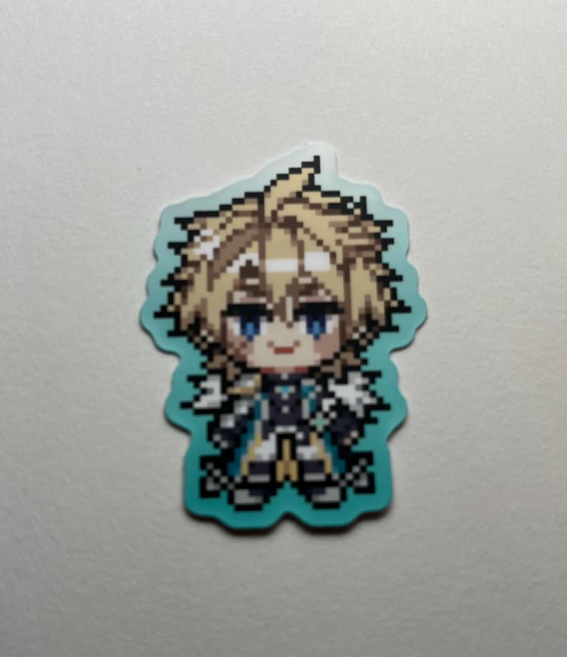 May include: A pixelated sticker featuring a character with blonde hair and blue eyes. The character is wearing a detailed outfit with black, white, and gold accents. The sticker has a light blue border and is set against a white background.