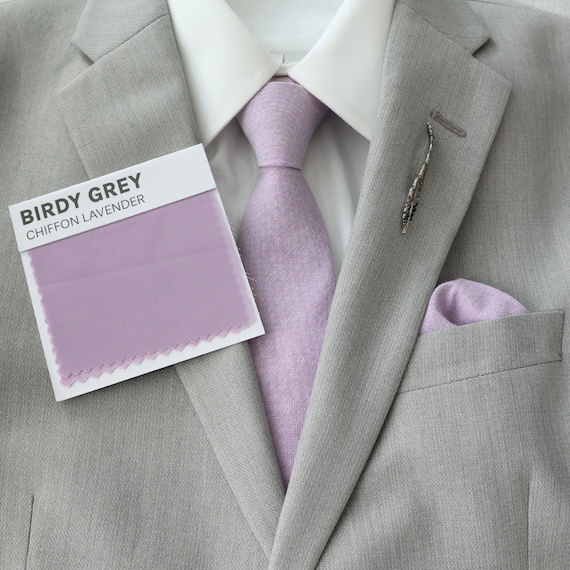 lilac tie with grey suit