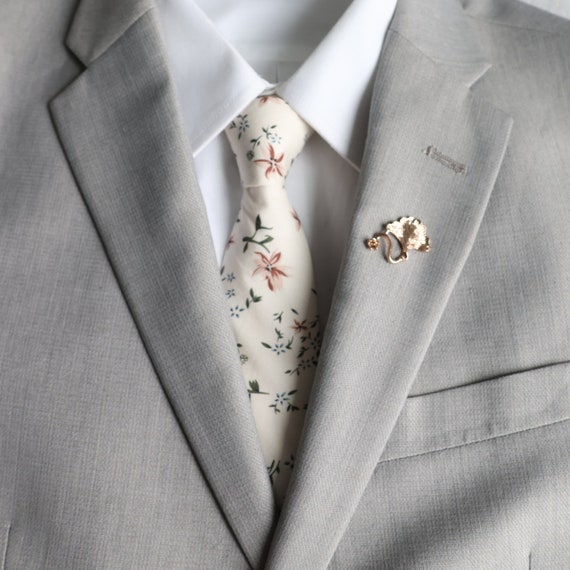 light grey suit floral tie
