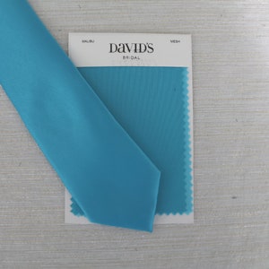 malibu blue vest and tie