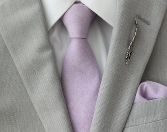 grey suit light purple tie