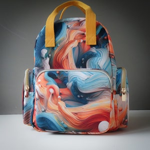 Mittelgroßer Rucksack Türkis Orange liquid art | wasserabweisend | Kunst abstrakt Rucksacktasche viele Fächer Reißverschluss Alltagstasche