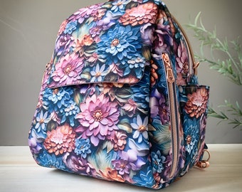 Damen Rucksack mittelgroß | Rucksacktasche viele Reißverschlüsse | 2 in 1 Tasche | 3D Blumen blau lila | praktische Umhängetasche Multi