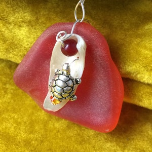 Tumbled glass, oyster shell with turle charm and fire opal Swarovski crystal pendant