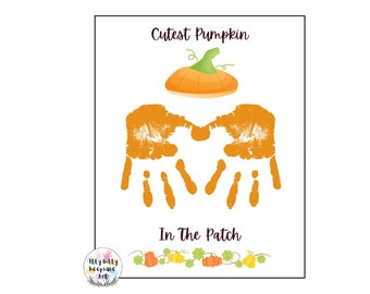 May include: A printable handprint craft for kids. The image shows two orange handprints forming a pumpkin shape with a small orange pumpkin on top. The text reads "Cutest Pumpkin In The Patch".