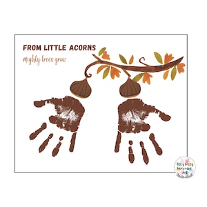 May include: A printable craft for kids featuring two brown handprints with the text "From little acorns mighty trees grow" and a brown branch with acorns and leaves.