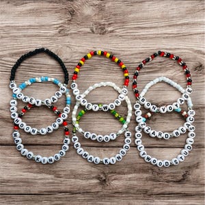 Disney Parks inspired bracelets,Magic Kingdom, Epcot, Hollywood Studios, Animal Kingdom, Typhoon Lagoon, Blizzard Beach, Mickey Ears, more..
